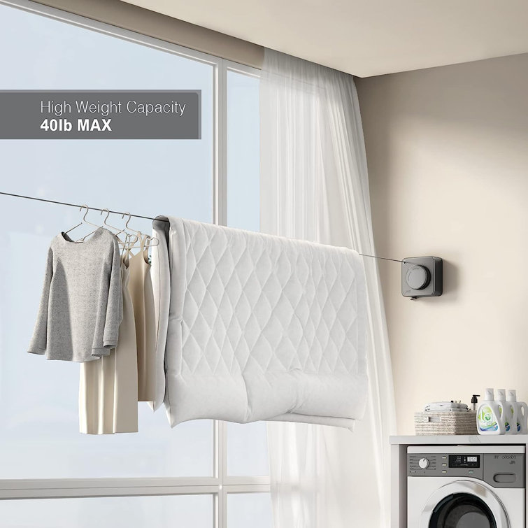 Wall retractable outlet clothes line